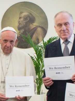 Pope holding #weremember sign