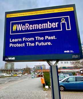 Billboard with #weremember sign