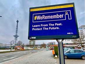 Billboard with #weremember sign